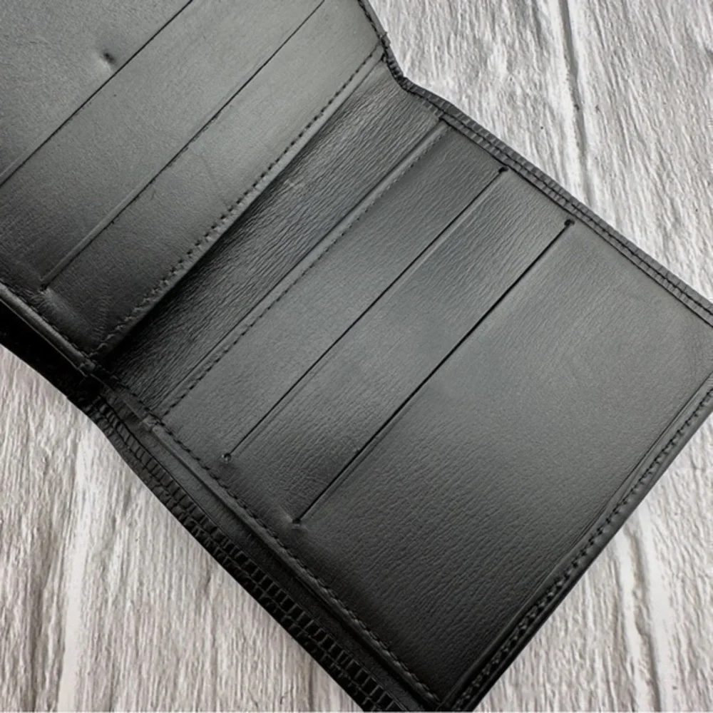 AUTHENTIC Louis Vuitton Marco Wallet. Previously owned. Black.